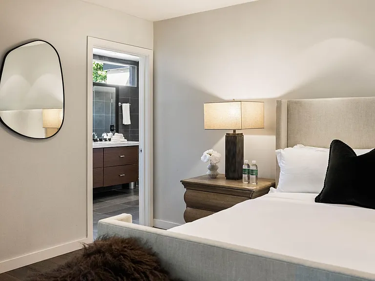 Each bed is outfitted with fresh hotel-grade linen.