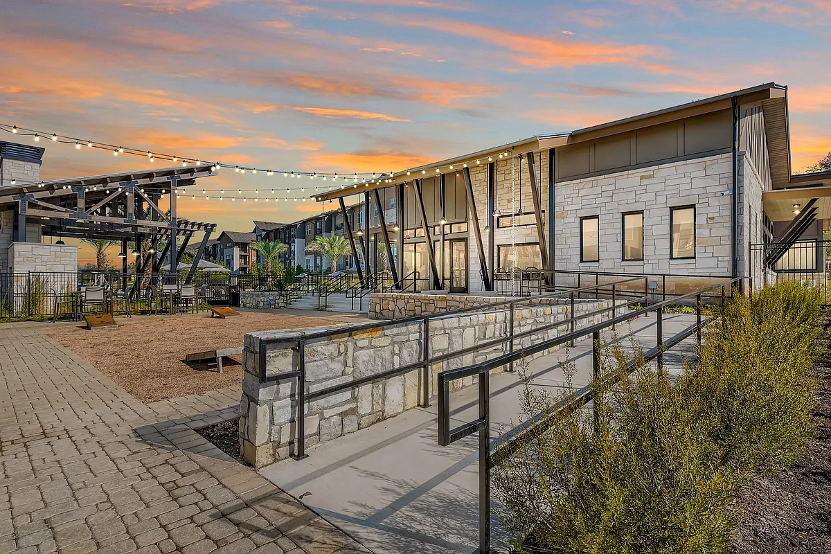 Communal space with lawn games - Cypress McKinney Falls