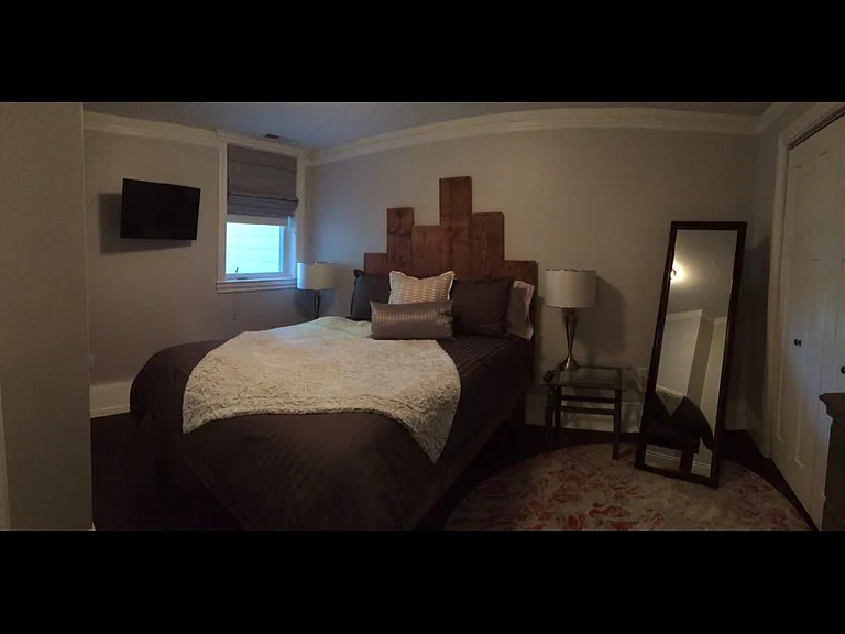 Bedroom with queen bed, large closet