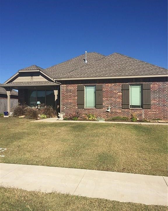 Side entry two car garage, double gate. Extra concrete!