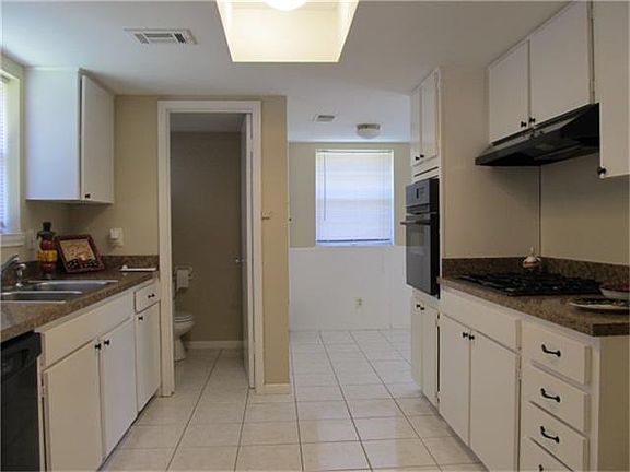 Formal living and dining rooms, with new carpet and paint