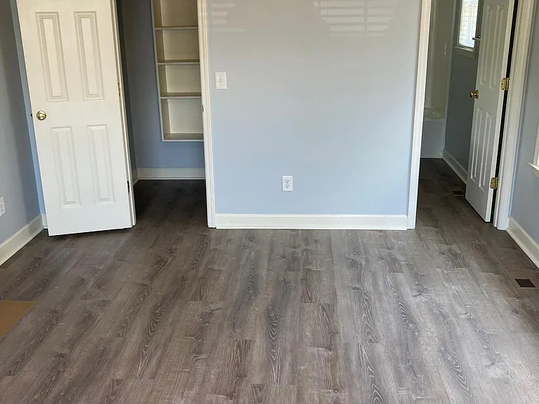 Downstairs master bedroom...door to closet and door to master bathroom.