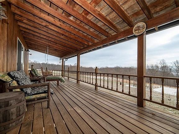 HUGE EAST-FACING COVERED FARMHOUSE PORCH OVERLOOKING THE LAUREL HIGHLANDS.