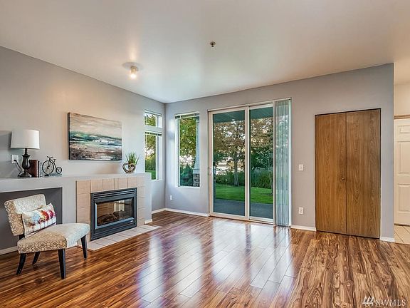 Another View of Living Room - Slider to Exterior Patio - Plenty of Storage with Guest Closet.