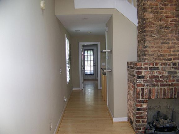 From the living room looking back thru the kitchen to the do