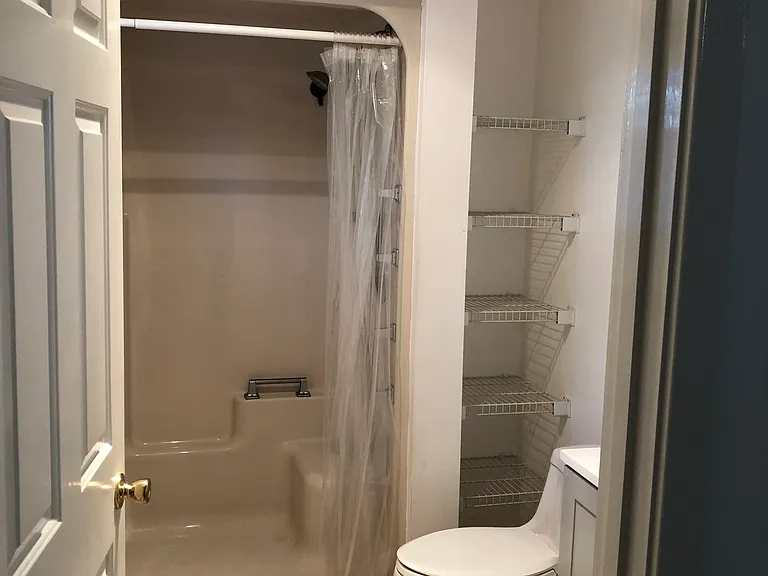 Primary BR with en suite shower bathroom and new vanity.