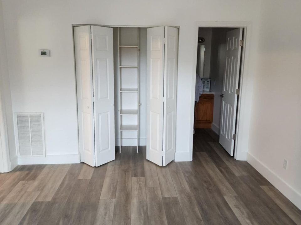 Large bedroom with vaulted ceiling