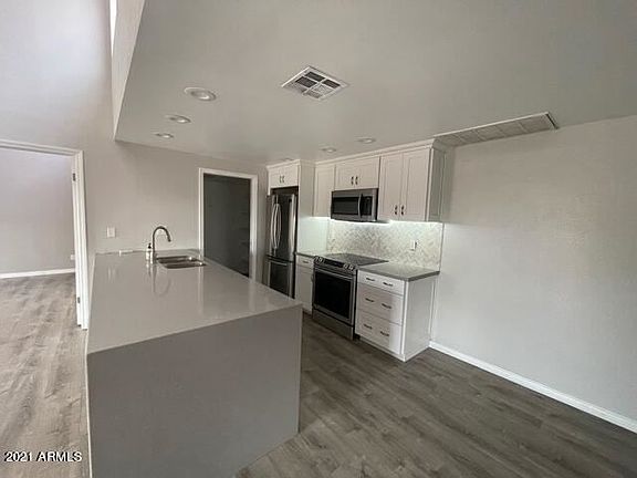 2nd image of 6900 E Gold Dust Ave Unit 104