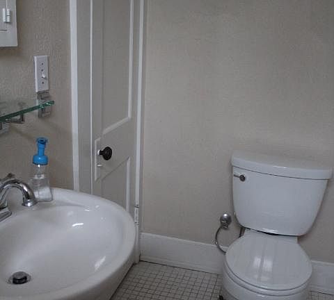 That door is the largest medicine cabinet (lots of shelves that are only 4 inches deep).