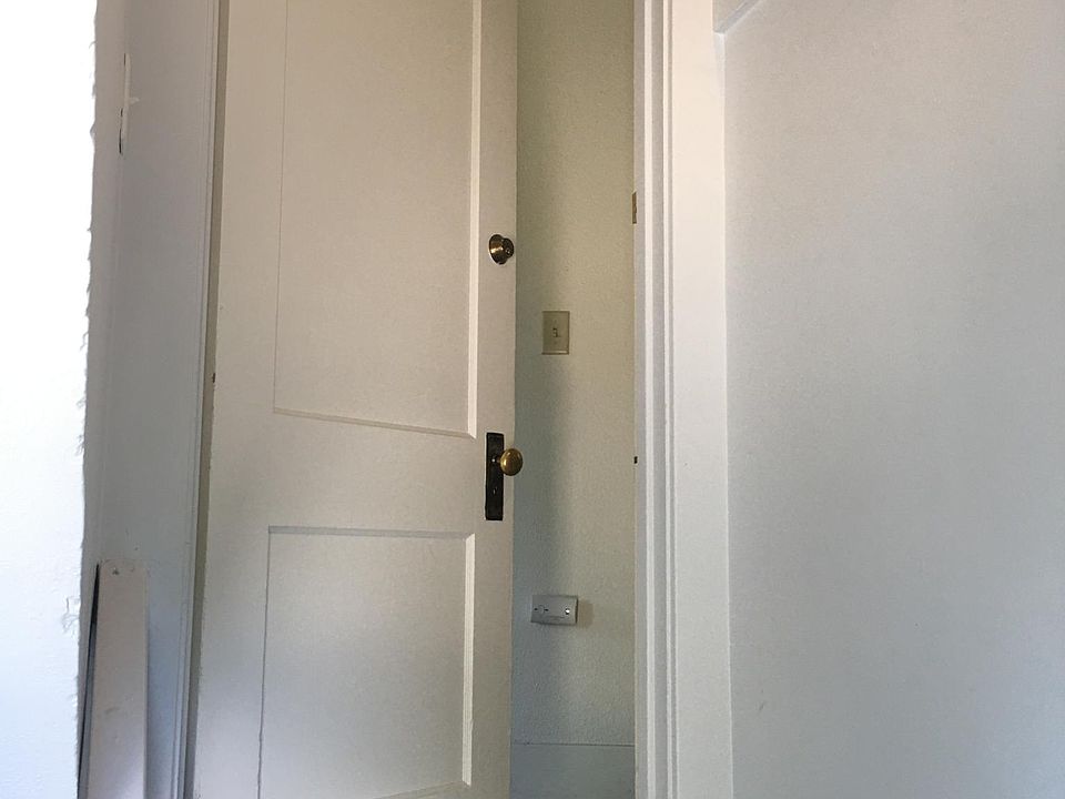 Unit B Front door up 4 steps from ground level.