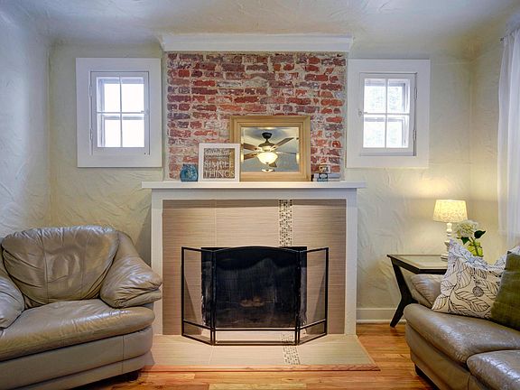 Exposed Brick Fireplace