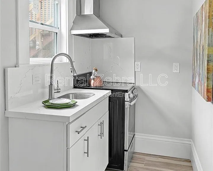 1823 1/2 Delaware St — Photo 4