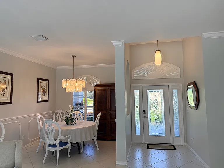 Dining room and adjacent foyer.