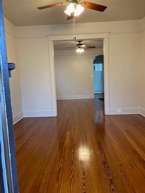 Living room. Refinished hardwood floors.