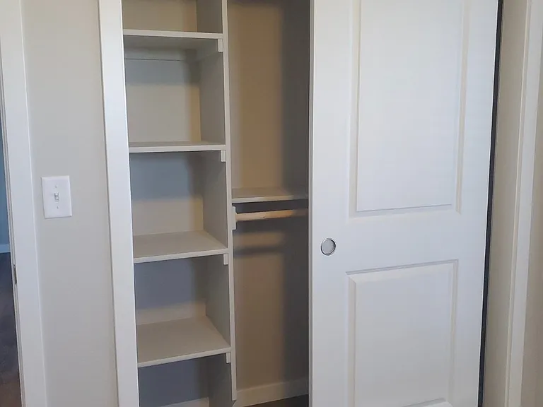 Closet organizer in each bedroom