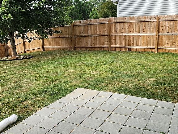 Newly fence and 10x10 pavers