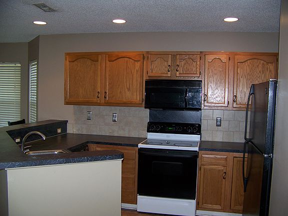 Wood Cabinets & Tile Backspl