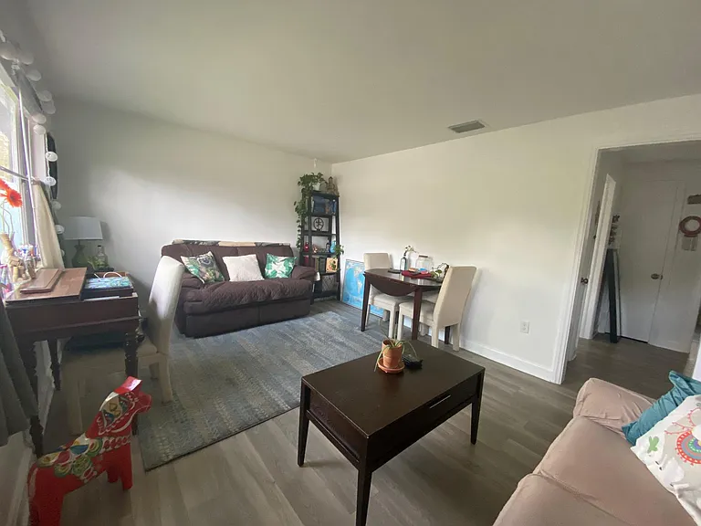 Living Room. All new flooring throughout apartment