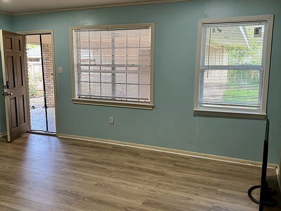 ___ Living Room
"Bright and spacious living area with new wood-look flooring and plenty of natural light. A cozy space to relax, gather, and entertain."