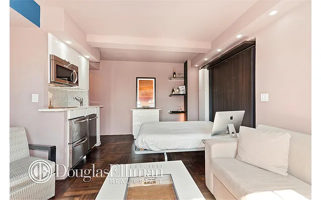 Sold by Douglas Elliman | media 18