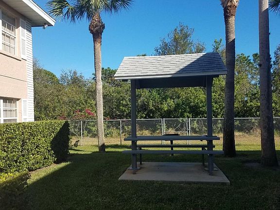 COVERED PICNIC TABLE WITH GRILL