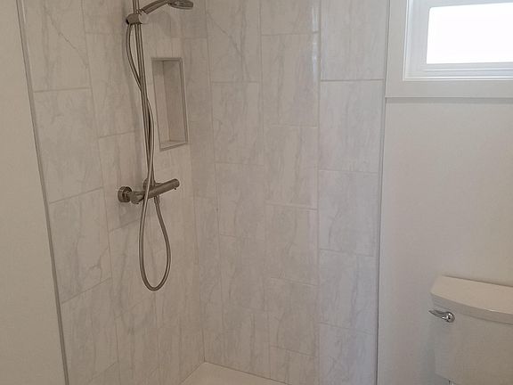 Front hall bathroom shower (shower doors added before move-i