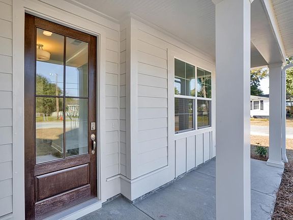 Photos are of a similar home