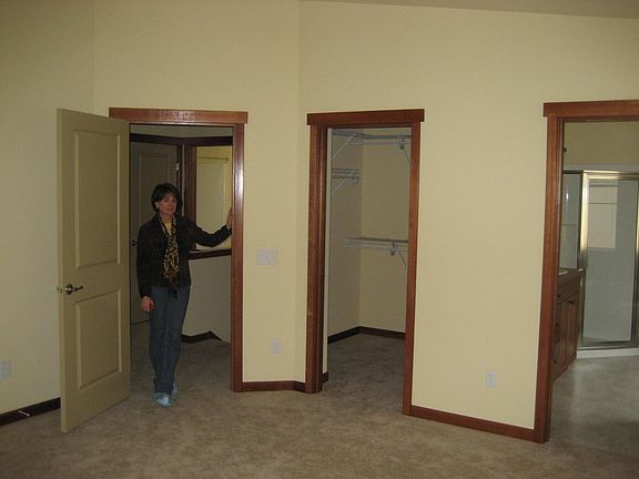 Master bedroom entry and doors to closet and Master Bath.