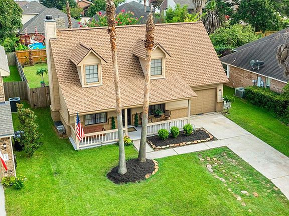 Nice sized yard front and back - driveway accomodates two extra cars