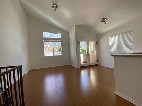 Living room with bright & high ceiling