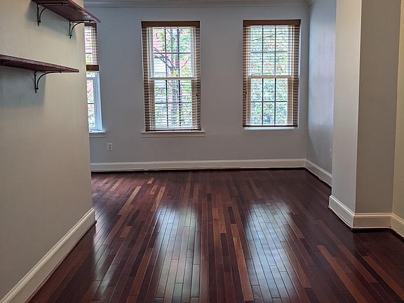 living area fitted with beautiful hardwood floors