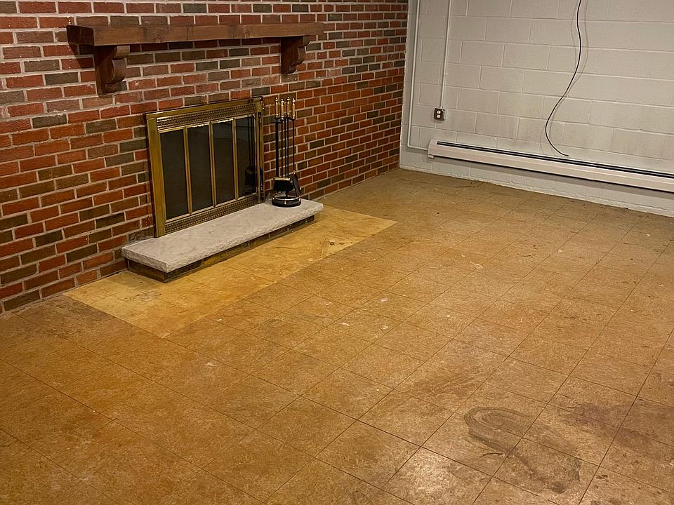 Basement rec-room with fireplace