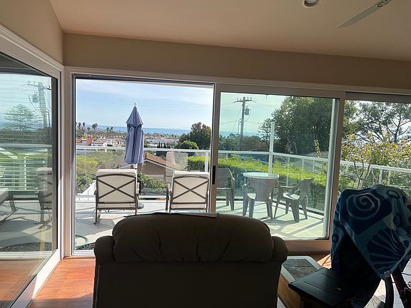 Office/ deck room has 3 glass walls with Ocean Views to the South
