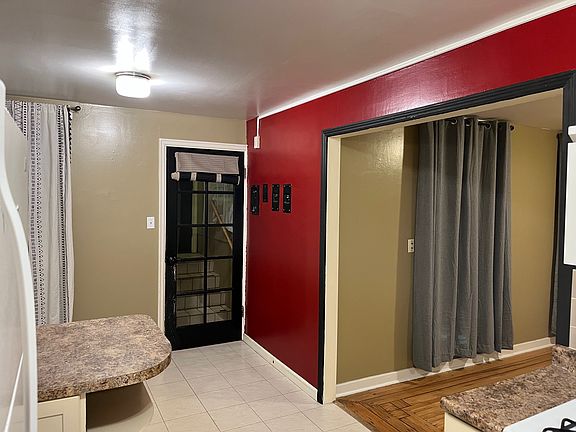 The dining area is just inside from the arctic entry, leading to the kitchen and living room.