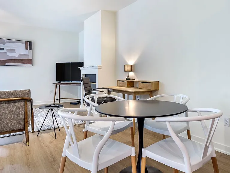 Furnished+ apartment homes include a dining set (Representative Image exact items and style of furnishings may vary)