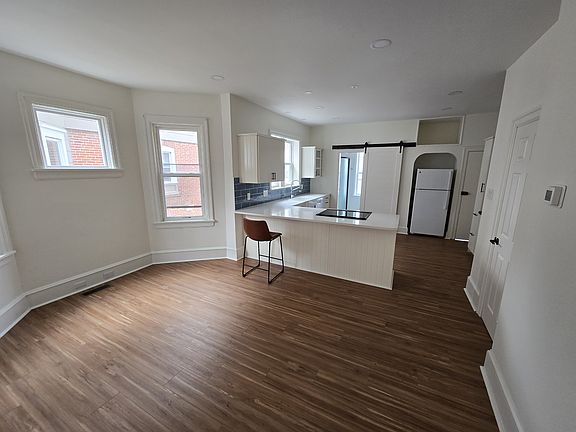 Dining space (countertop seating plus ample room for a table)