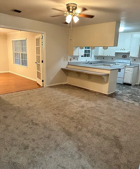 Dining room and kitchen and entrance into bonus room