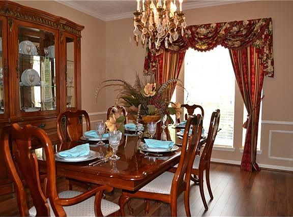 Formal Dining Room with Wood Laminate Floors.