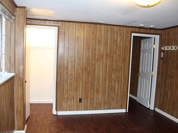 Partial view of the Living room. The open door to the left is to the coat closet. The door to the right goes to the Bedroom and the Entry is behind to your left out of the picture.