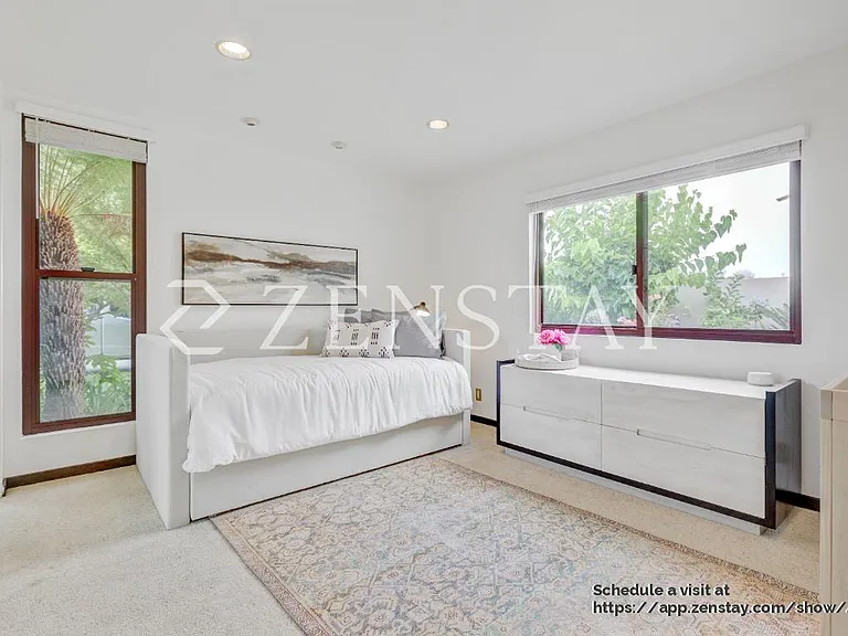 Comfortable bedroom with queen bed and inviting layout