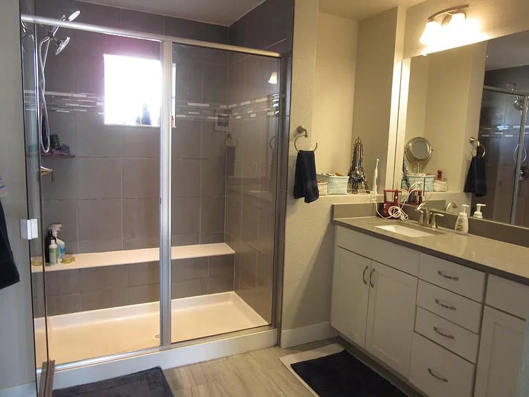 Master Bathroom with large shower and adjacent big walk-in closet