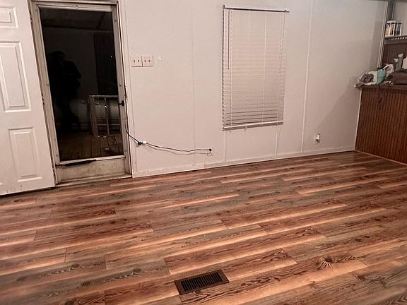 Living room that leads to front porch