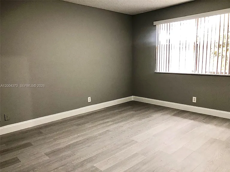 8761 Wiles Rd #306 — Photo 14