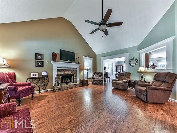 Open great room with beautiful rock fireplace