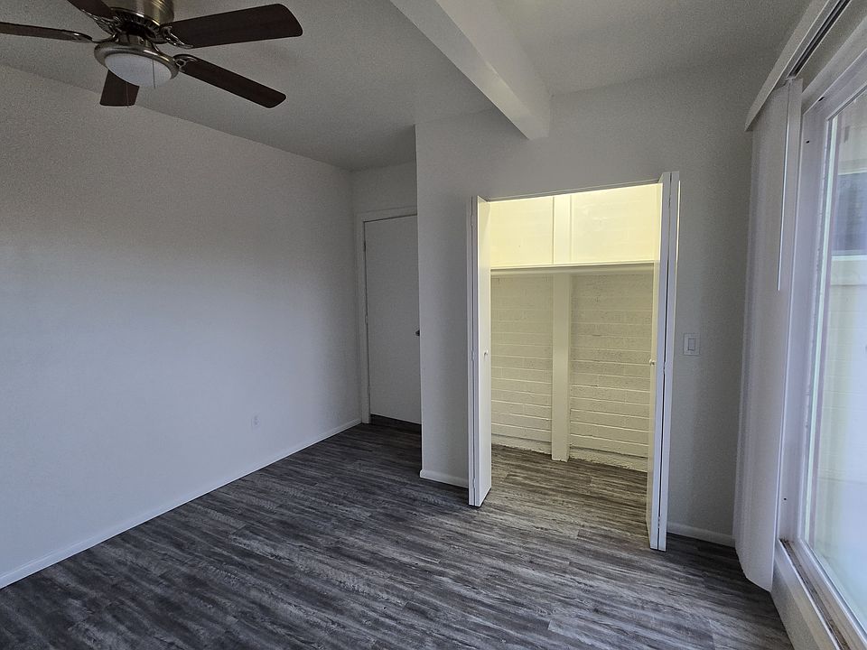 Bedrooms with ceiling fans and large closets.