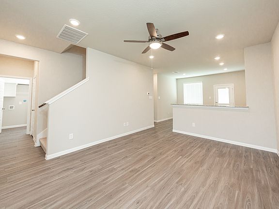Family Room to Kitchen and Dining Area