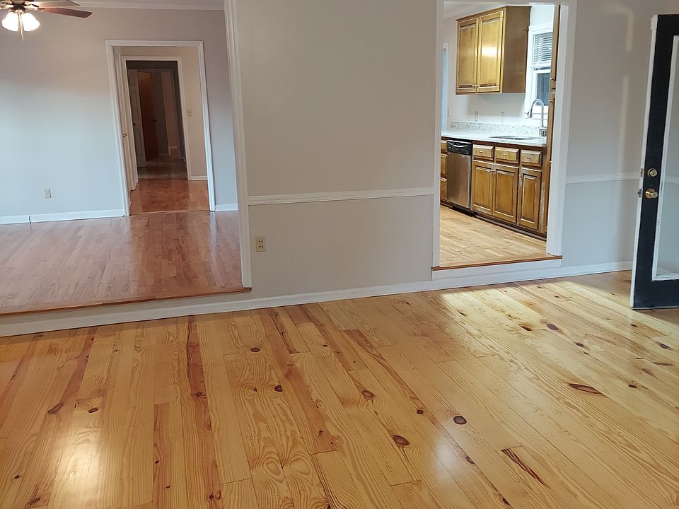 new floors, new paint, new counter tops, new tankless water heater, new front door, fenced yard with storage shed - beautiful home