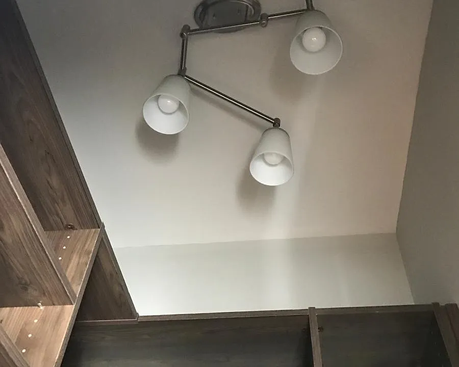 custom lighting in spacious walk-in closets