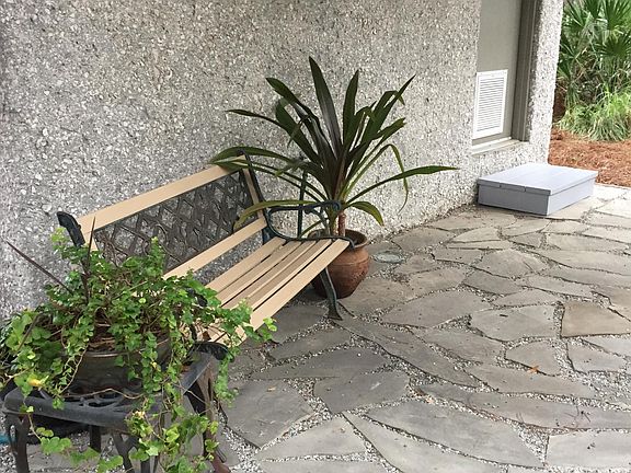 A tropical patio for relaxing, entertaining, or outdoor projects.