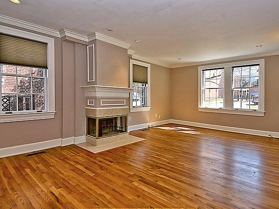 Huge Living Room with windows on two sides. Hardwood flooring throughout!